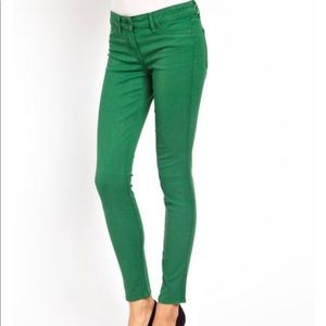 Green, skinny jeans